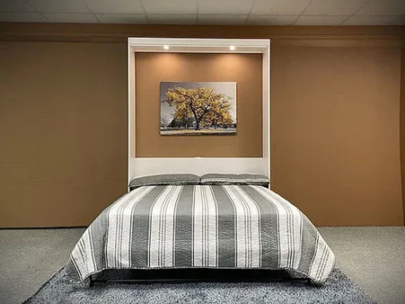 How can a queen Murphy bed help create a more versatile living area?