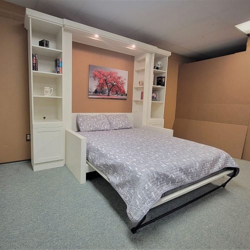 White murphy bed shown open between the arms of the sofa 155-0622 style murphy bed with sofa